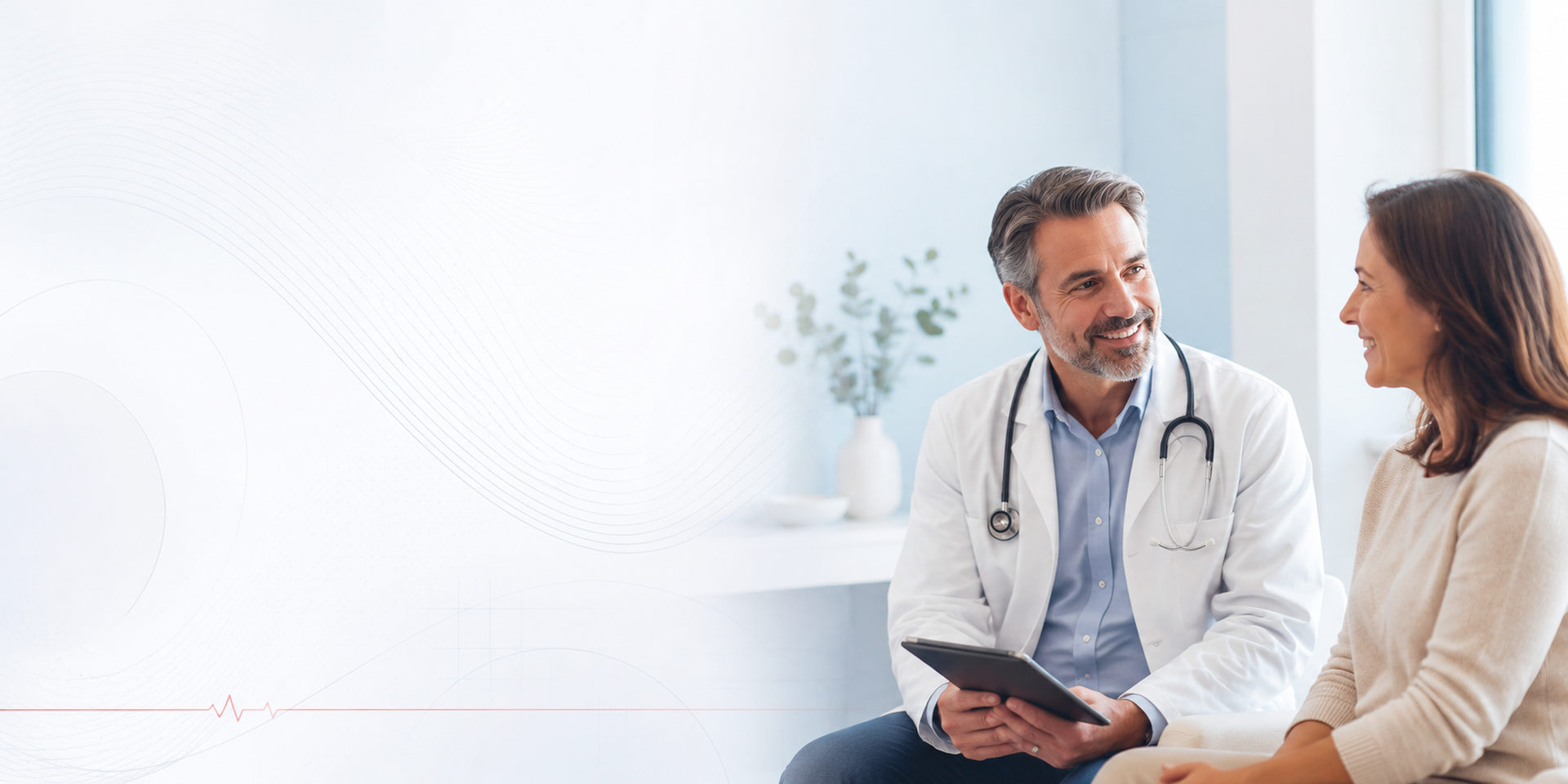 A physician talking with a patient in the practice's Huntington office.
